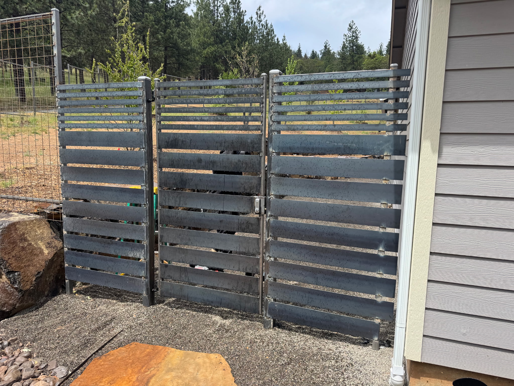 Custom water jet cut art gate fabricated in the Mountain View Fence shop in White City, Oregon