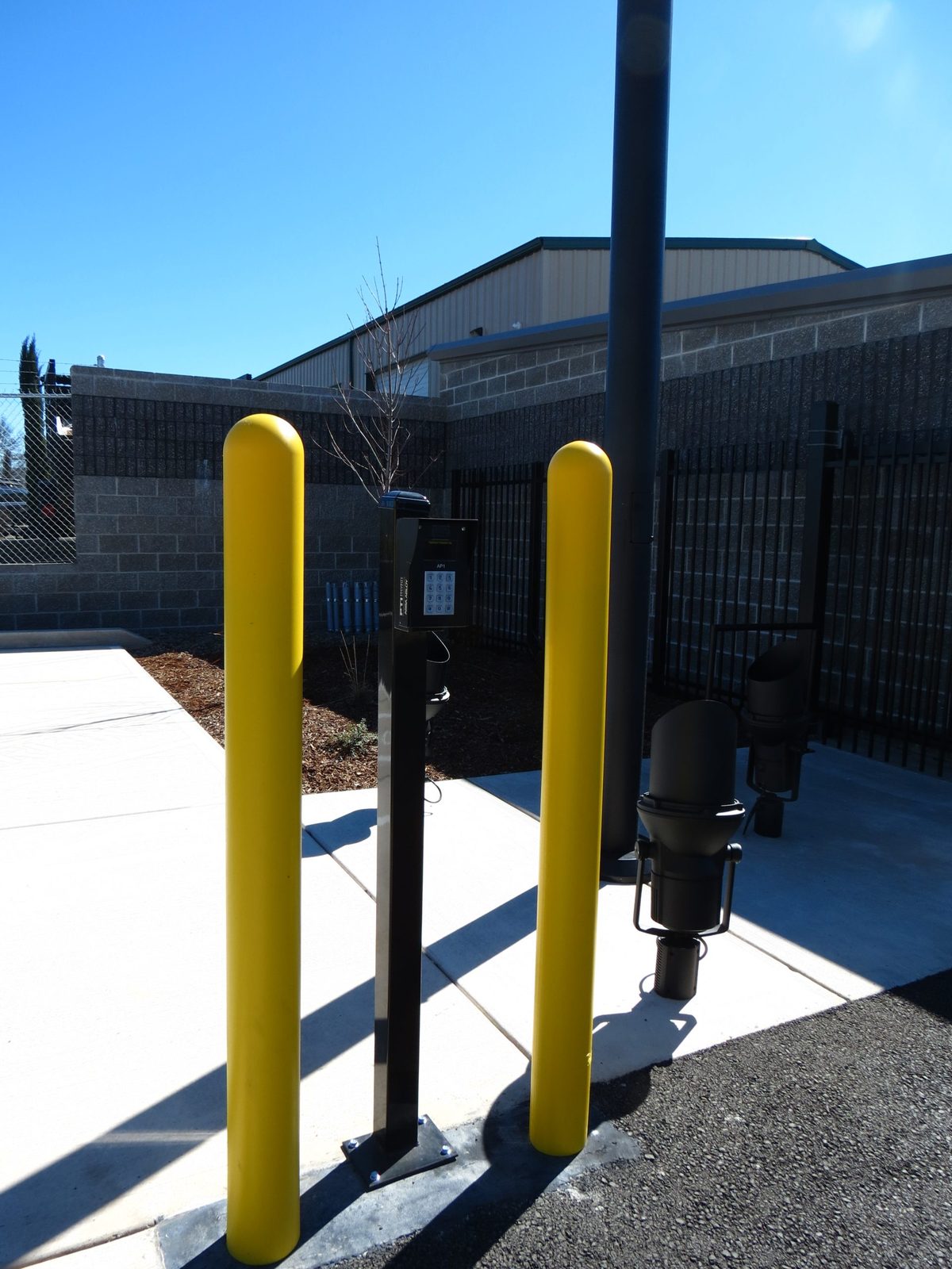 4 Bollards with Safety Yellow PVC Sleeves