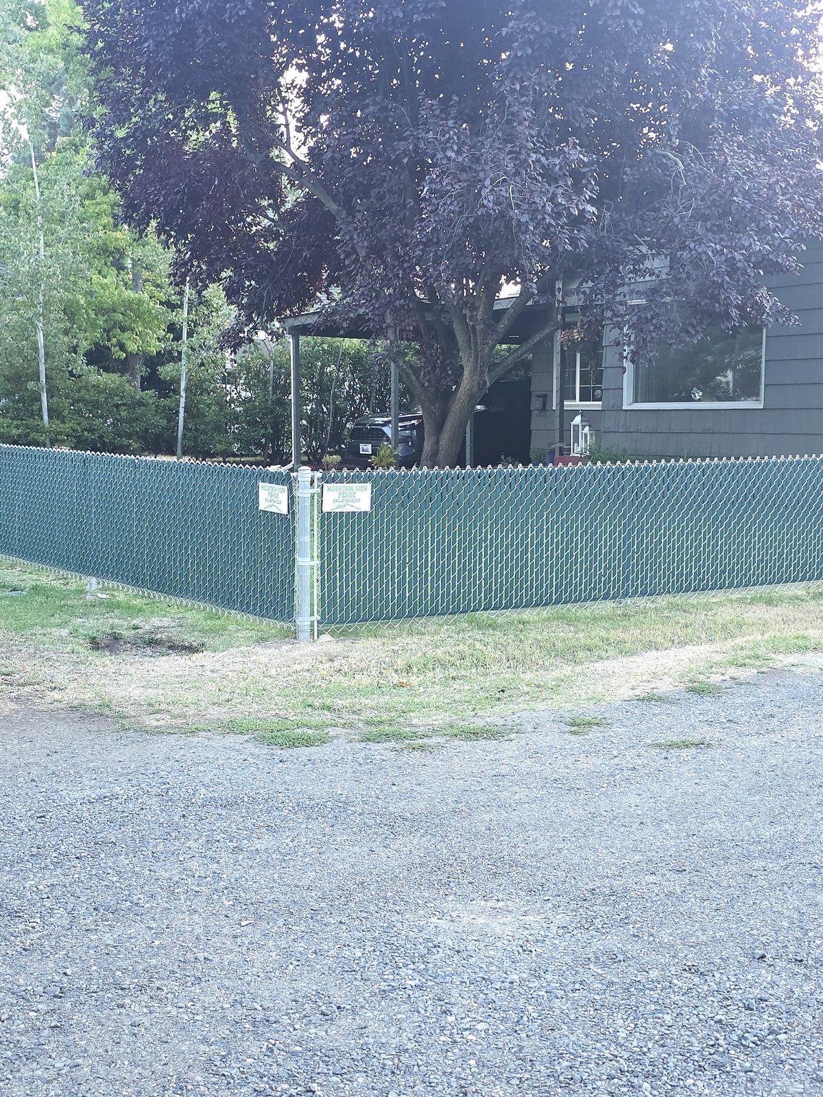 4' High Chain Link Fence with Green Privacy Slats