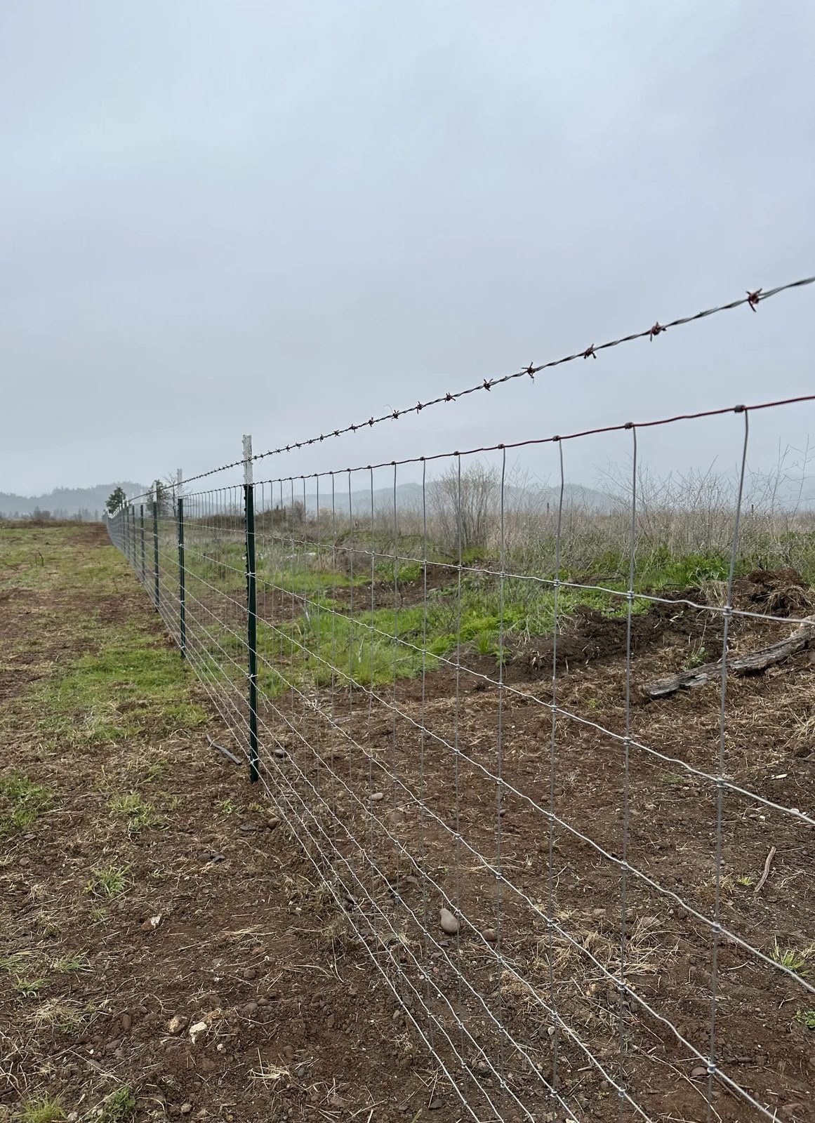 47 Field Fence with 1 Strand Barbed Wire on Top