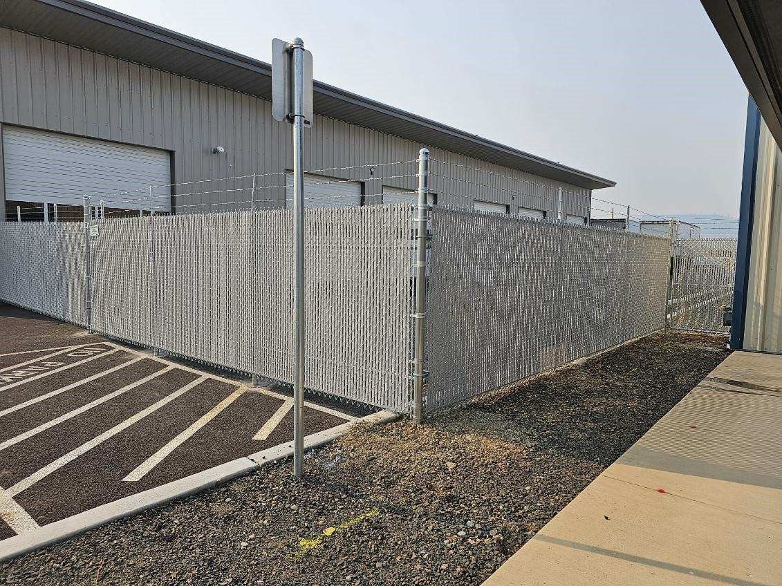 6' High Chain Link Fence with 3 Strands Barbed Wire on Top & Gray Privacy Slats