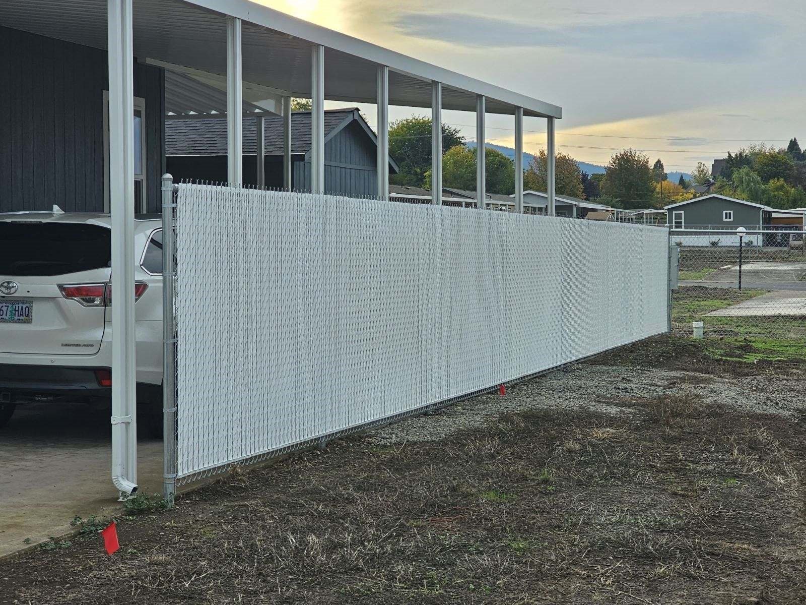 6' High Chain Link Fence with White Privacy Slats