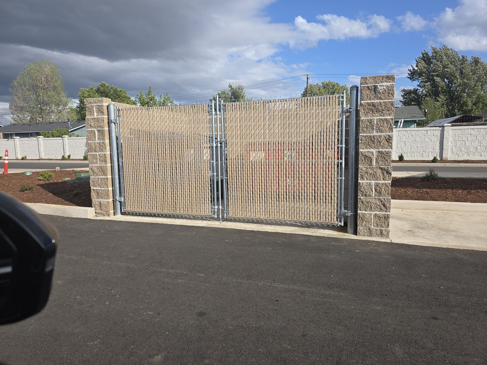 6' High Double Swing Chain Link Gates with Tan Privacy Slats for Trash Enclosure