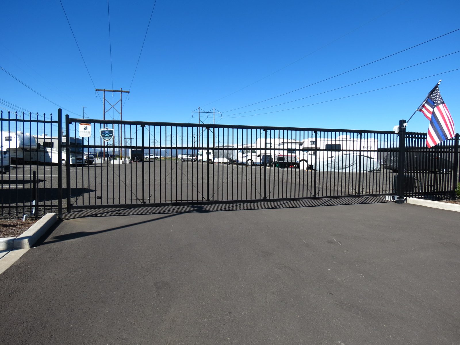 6' High Ornamental Iron Cantilever Style Roll Gate with Automation