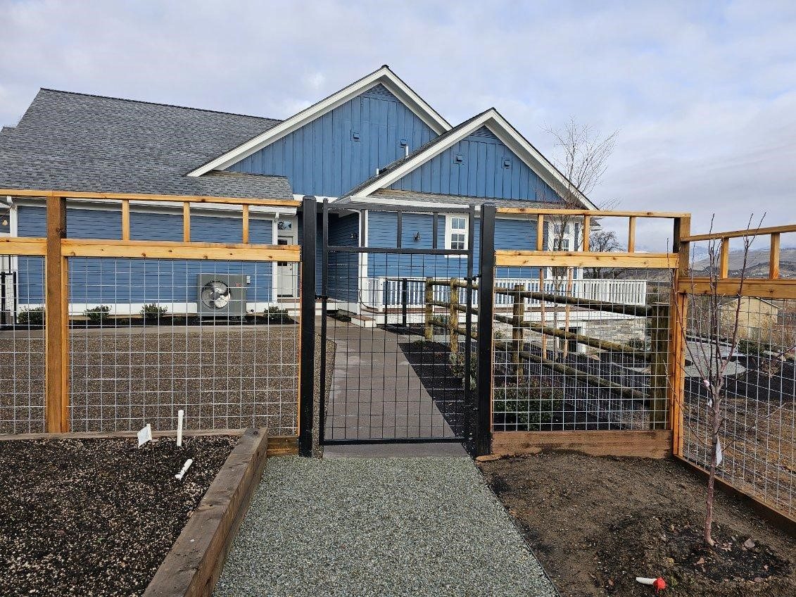 Custom Wood Hog Panel with 4" x 4" Grid Panels, Powder Coated Walk Gate to Match