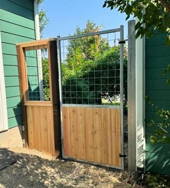 Custom walk gate with solid Cedar bottom and 4" x 4" grid mesh top to match the fence