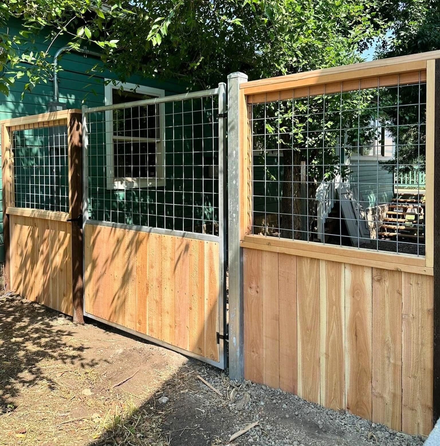 6' tall custom fence with 3' solid Cedar and 3' of 4" x 4" grid mesh