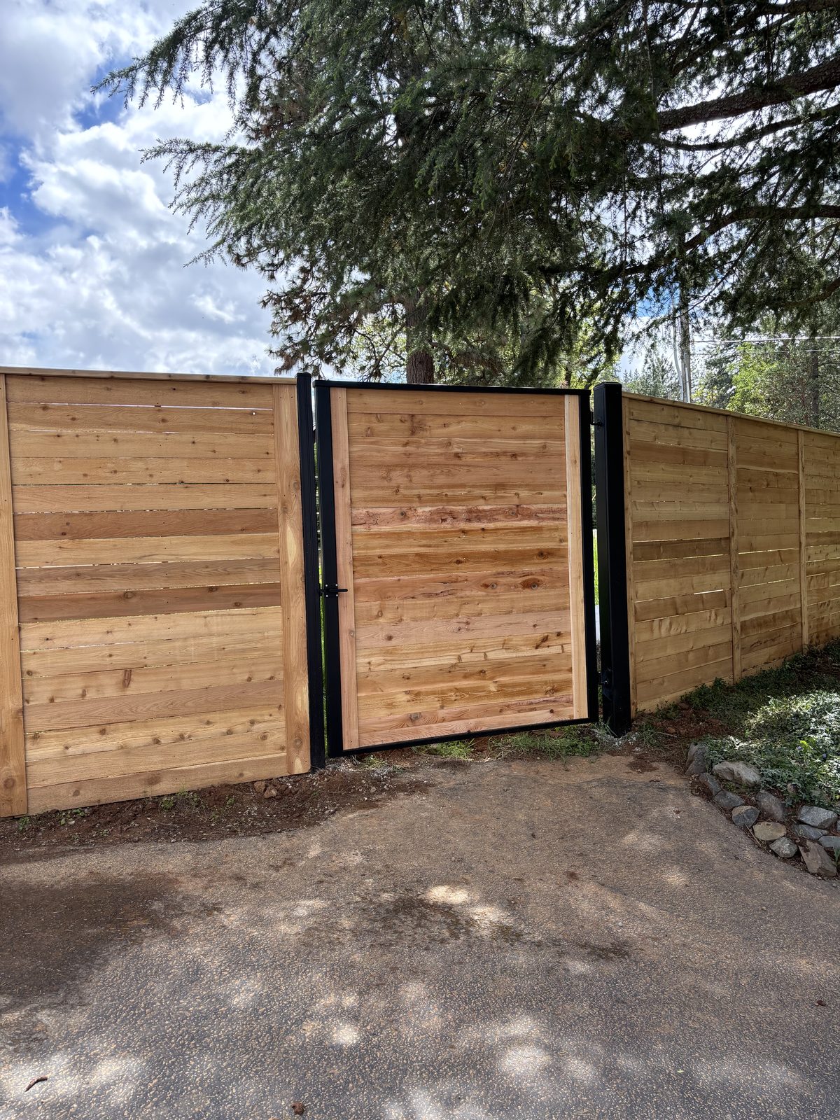 Sturdy Horizontal Cedar Fence with Steel Framework